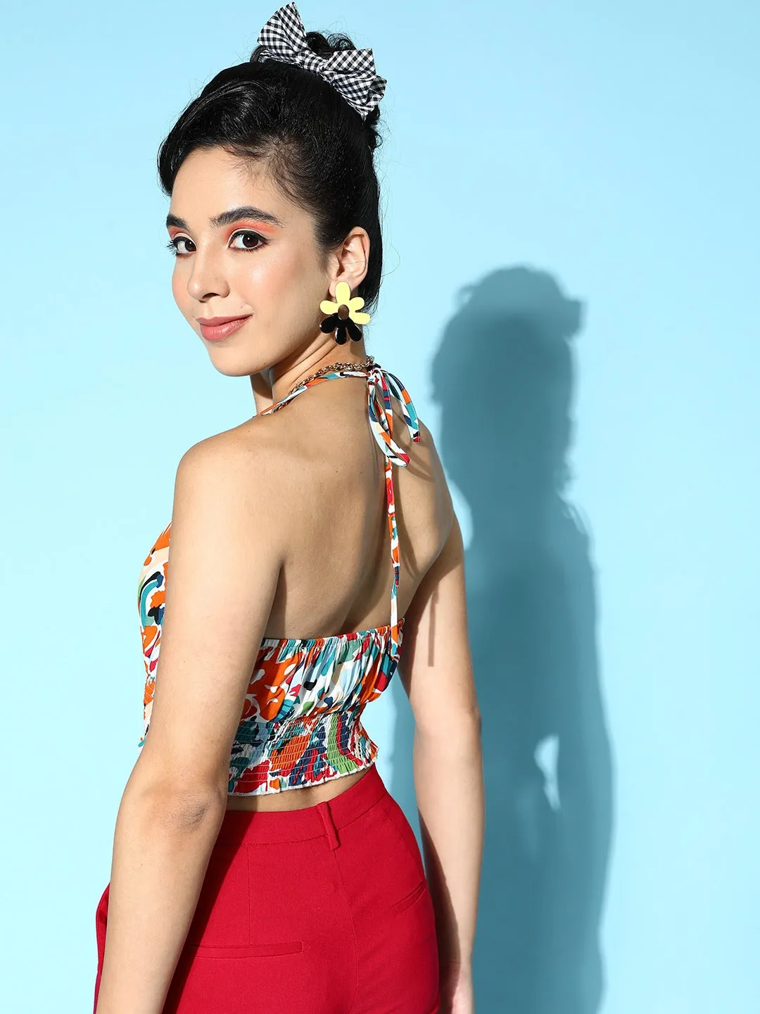 Berrylush Women White & Multicolour Abstract Printed Halter Neck Crepe Tie-Up Backless Cropped Top